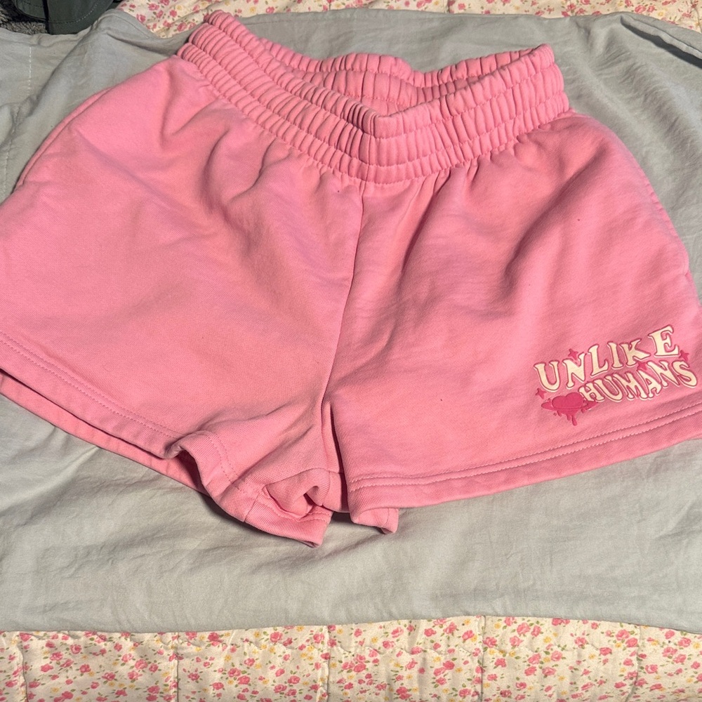 Pink Athletic Lounge Shorts with Elastic Waist and 'Unlike Humans' Accent